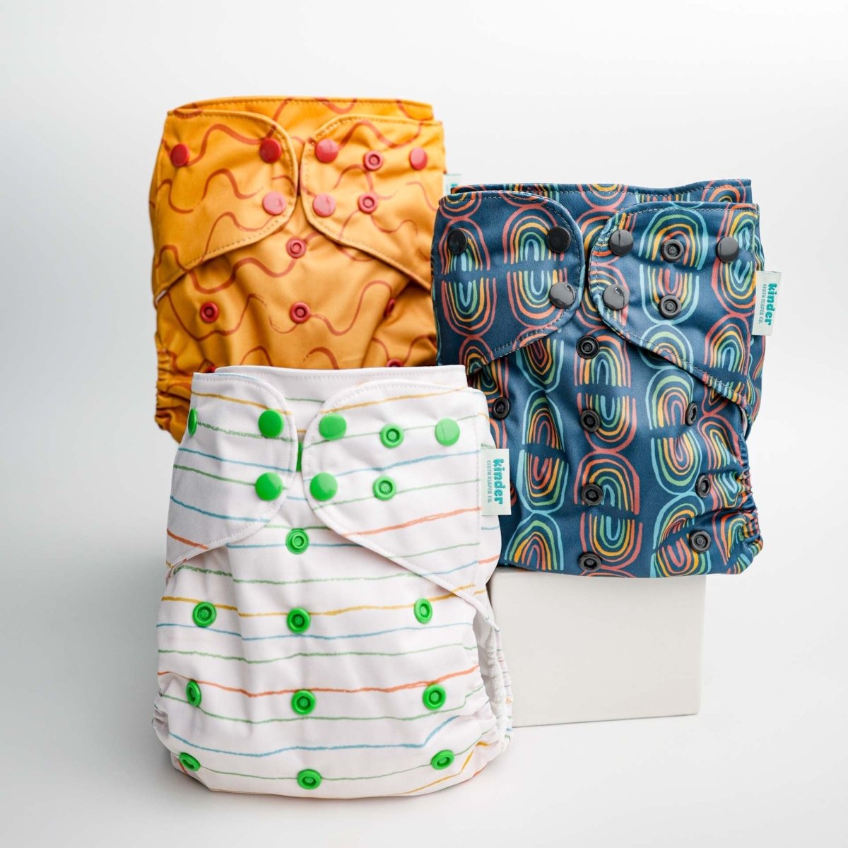 Abstract: Essentials Pocket Cloth Diaper with Athletic Wicking Jersey, Grows with your Baby - Kinder Cloth Diaper Co. - 09 - 06 - 03 - modern reusable cloth diapers and more for birth to potty training - Pittsburgh Based Small Business