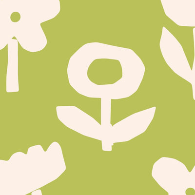 White floral shapes on a green background