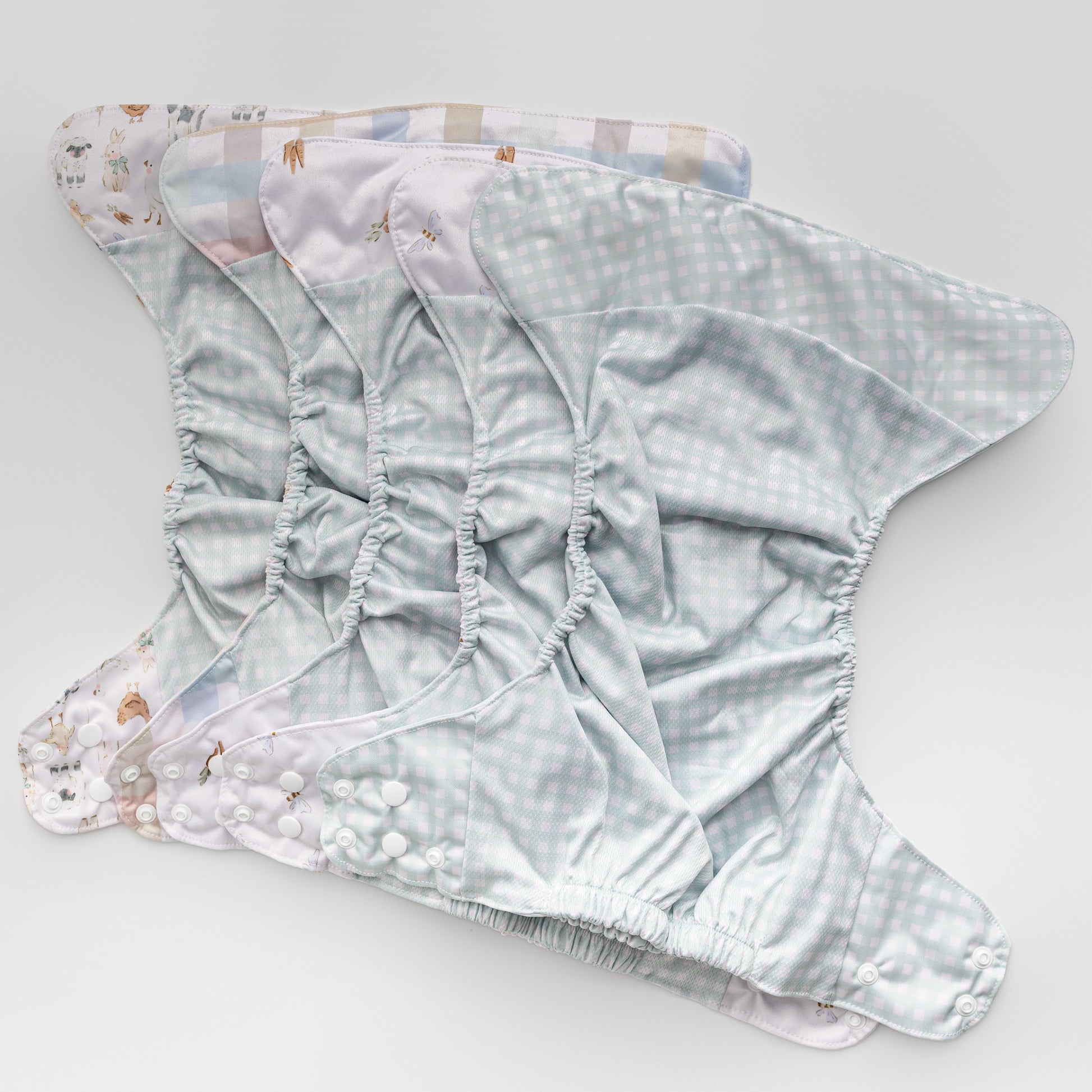 Abstract: Essentials Pocket Cloth Diaper with Athletic Wicking Jersey, Grows with your Baby