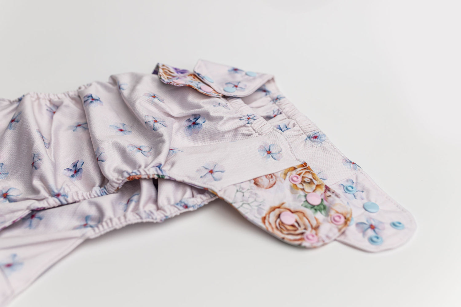 Floral: Essentials Pocket Cloth Diaper with Athletic Wicking Jersey, Grows with your Baby