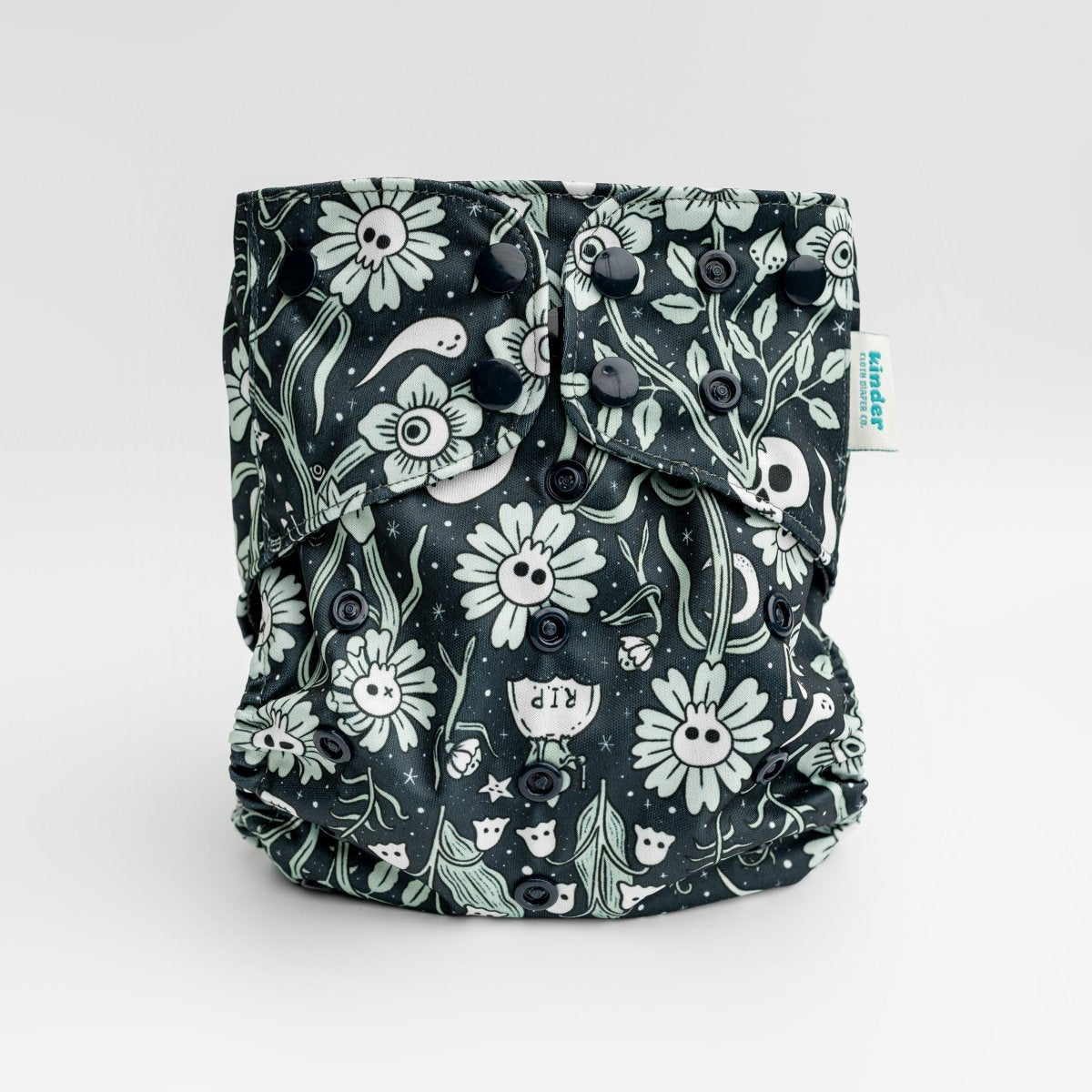 black cloth diaper with whimsical ghosts and mushrooms with black snaps by kinder cloth diaper co with art by Malika Buttinger, one size fits most