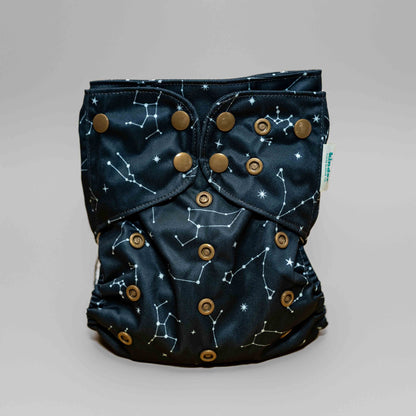 Black Reusable Modern Pocket Style Cloth Diaper with Athletic Wicking Jersey Mesh Breathable Lining in a space celestial little dipper stars prints